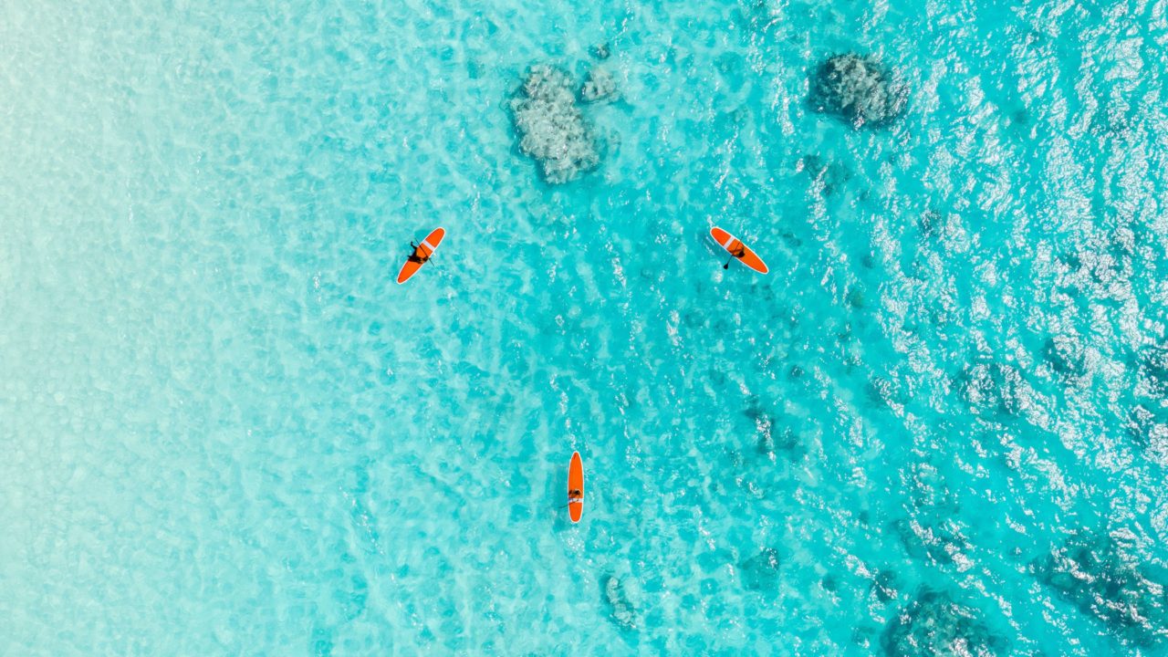kayaks in Bermuda water in shape of a triangle